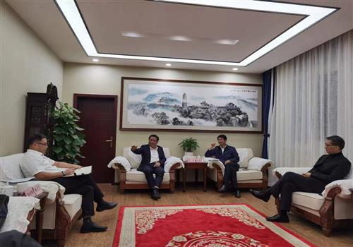 黎明带队与高坪区委政府商谈学院建设发展有关事宜